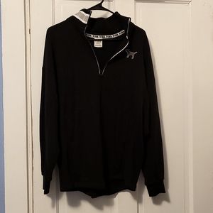 Quarter neck zip. Size small. Pink sweatshirt in black